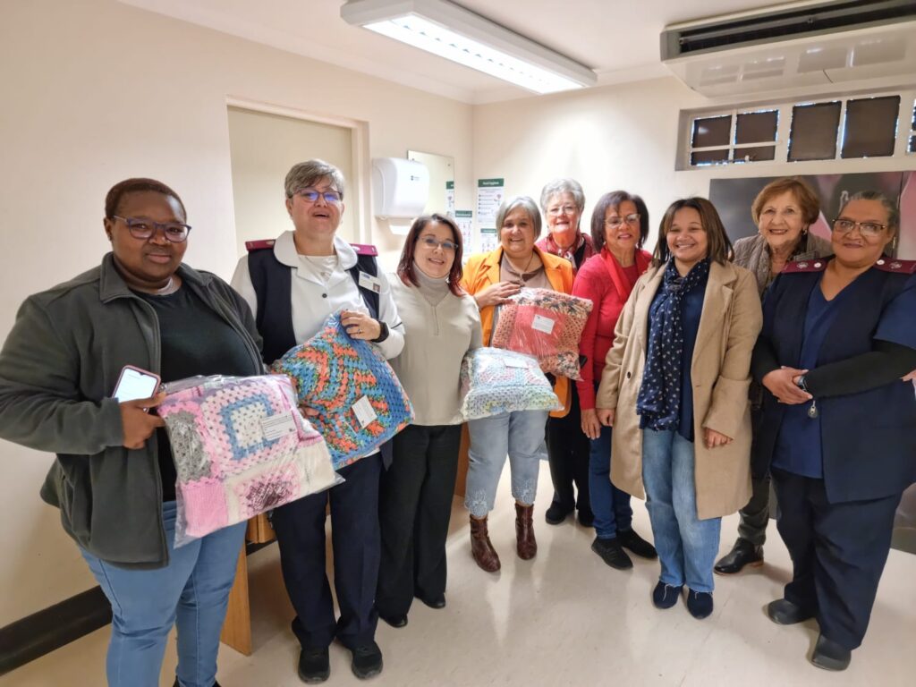 Human Settlements, Planning and Development donated 11 handcrafted blankets to cancer patients
